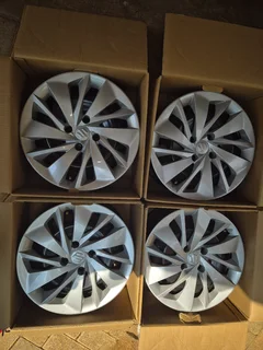 Suzuki Baleno 4 x wheels with hub caps brand new