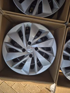 Suzuki Baleno 4 x wheels with hub caps brand new