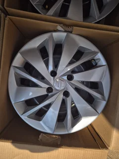 Suzuki Baleno 4 x wheels with hub caps brand new