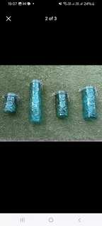 Four (4) Green coloured decorative Mason style jarsIn very good condition with no damage