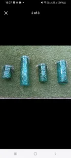 Four (4) Green coloured decorative Mason style jarsIn very good condition with no damage