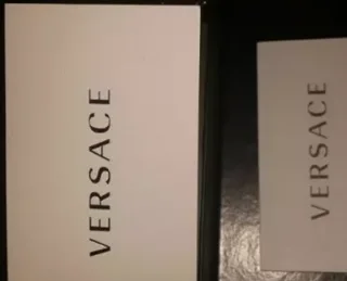Versace original Sunglasses box and cloth never been used and  still in the sealed packaging.
