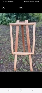 Hardwood combined easel and  display frame .all one unit