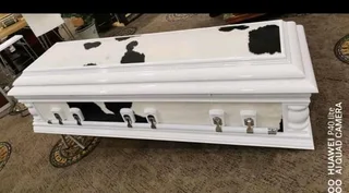 CASKETS AND COFFINS