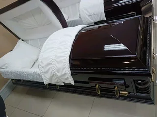 CASKETS AND COFFINS