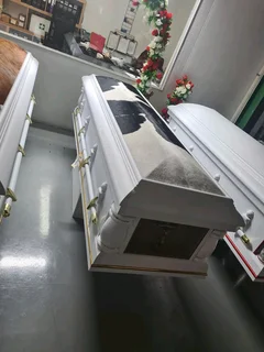 Coffins ,Caskets ,Tombstones