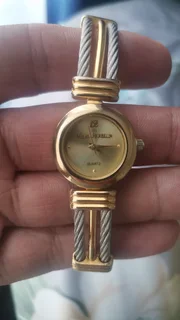 Ladies Michel Herbelin cable quartz watch and gold Delma watch for sale. Whatsapp 0835422642