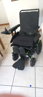 A power wheelchair (Q 100 series - Quickie)