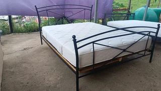 Queen size full foam mattress with a steel frame base and headboard in perfect condition