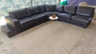 Genuine leather L shaped lounge suit for sale in good condition and very comfortable