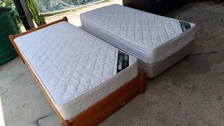Two single beds mattress and base in great condition and very comfortable