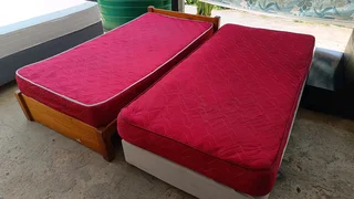 Two single beds mattress and base in good condition and very comfortable located in newlands west