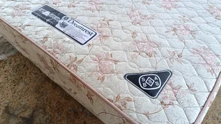 Queen size bed rest assured mattress and base in good condition and very comfortable
