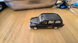 WELLY THE LONDON TAXI TX4 BLACK 1:34 DIE CAST METAL MODEL.