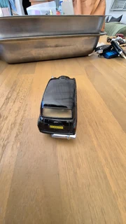 WELLY THE LONDON TAXI TX4 BLACK 1:34 DIE CAST METAL MODEL.