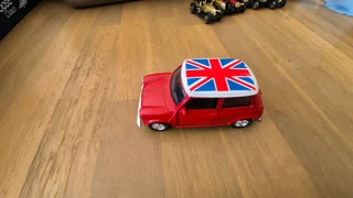 Speedy Power /Newray, Mini Cooper RHD in Red with Union Jack in 1:32 Scale.