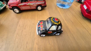 Kintoy Volkswagen VW Beetle Black Love Bug Car w/Motorized Pull Back & Go Action.