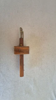 Vintage rosewood double pin scribe with brass inlets.