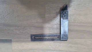 An adjustable square made by H.M.M Ltd, made in England, Pat no. 497450. Try square blade length 3 ¼