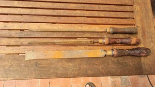 Vintage Rosewood handle big long files for sale.