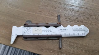 Orthops slide rule Raphaels LTD London.