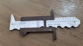 Orthops slide rule Raphaels LTD London.