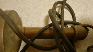 Vintage copper handle and frame lead light.