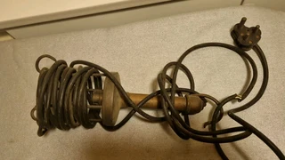 Vintage copper handle and frame lead light.