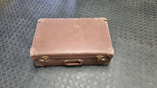 Old vintage suitcase up for grabs.