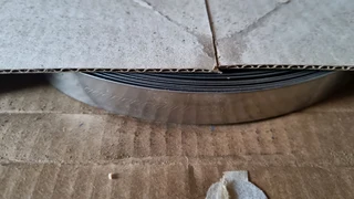 SS 304 s t r a p p i n g 12 7mm w i d e x0 75mm t h i c k 30 m r o l l.