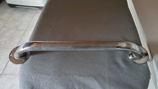 Support grab rail for bath or shower.