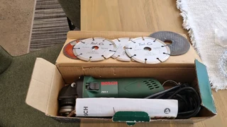 Bosch grinder with blades for sale.