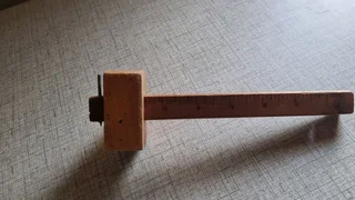 Wooden one pin scribe still in good nick.