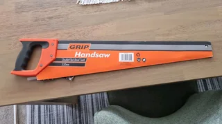 Grip hand saw. Brand new.
