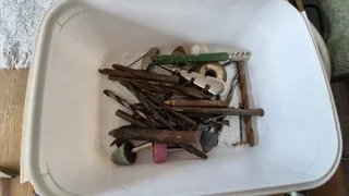 Lots of drill bits and woodwork tools.