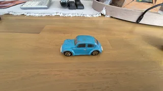 Realtoy Volkswagen VW Classic Beetle blue toy car.
