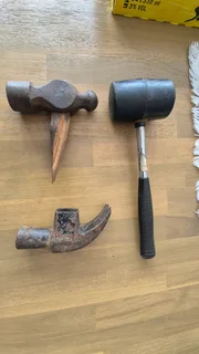 Hammer heads and rubber mallet for sale.