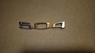 Bin45 used Peugeot 504 emblem logo symbol badge monogram tailgate boot.