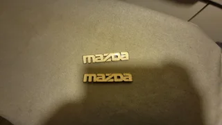 Mazda Front Grille Emblem Badge 323 323 Fa4 1977-1980 Nos Japan.