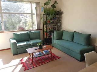 Green corner sofa in mint condition