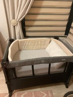 Baby bed side and travel cot