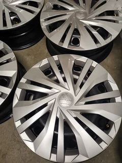 Brand new Set of OEM VW 16inch steel Rims with Hub Caps - R1200 per Set of 4 rims and 4 hubs