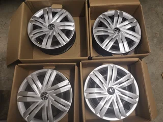Brand new Set of 4 x VW Polo 14Inch Factory OEM Steel Rims with Hub Caps - PCD 5/100