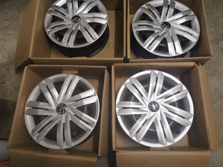 Brand new Set of 4 x VW Polo 14Inch Factory OEM Steel Rims with Hub Caps - PCD 5/100