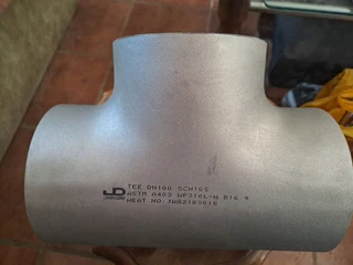 Stainless steel tee-piece.