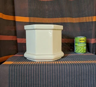 Ornamental pot plant holder.