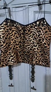 Evening top gold on black