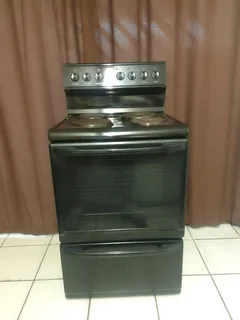 Defy 621 four plate stove with oven and warmer drawer