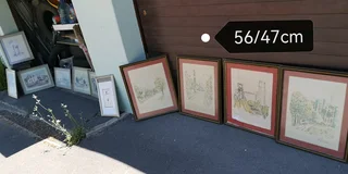 Photo frames including the art