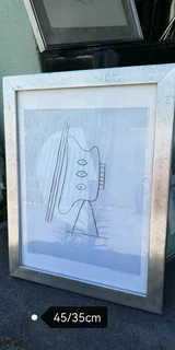 Photo frames including the art